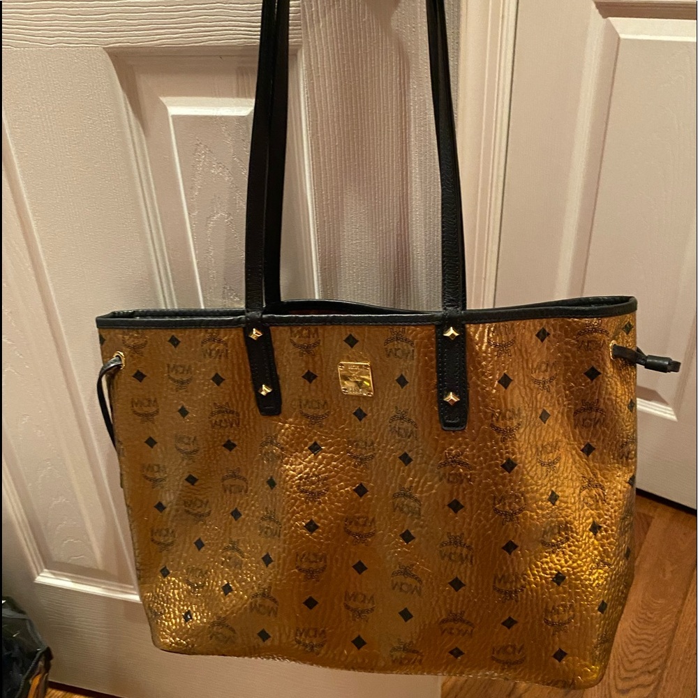 MCM Gold handbag with matching wallet